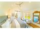 Serene main bedroom with high ceilings, a ceiling fan, and a walk-in closet at 155 Mado Ln, Palmetto, GA 30268