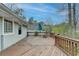 Spacious wooden deck with railing, offering a great space for outdoor dining and relaxation at 1830 Jan Hill Ne Ln, Atlanta, GA 30329
