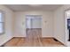 Dining room featuring wood floors, neutral walls and pass-through to kitchen at 1830 Jan Hill Ne Ln, Atlanta, GA 30329
