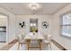 Dining room with decor, table set for four and view to kitchen at 1830 Jan Hill Ne Ln, Atlanta, GA 30329