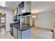 Kitchen features stainless steel appliances, granite counters, and opens to dining and living areas at 1830 Jan Hill Ne Ln, Atlanta, GA 30329