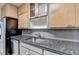 Updated kitchen with stainless steel appliances, granite countertops and light wood cabinets at 1830 Jan Hill Ne Ln, Atlanta, GA 30329