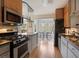 Modern kitchen featuring stainless steel appliances and stylish cabinetry at 1830 Jan Hill Ne Ln, Atlanta, GA 30329