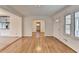 Open living room with hardwood floors and seamless transition to other rooms at 1830 Jan Hill Ne Ln, Atlanta, GA 30329