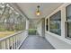 This cozy covered porch offers a peaceful outdoor space at 1830 Jan Hill Ne Ln, Atlanta, GA 30329