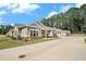 Inviting view of single-story homes featuring neutral siding, well-maintained lawns, and long driveways at 3901 Shelleydale Dr, Powder Springs, GA 30127