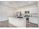 Modern kitchen with stainless steel appliances, granite counters, and white cabinetry at 3901 Shelleydale Dr, Powder Springs, GA 30127