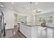 Open kitchen with stainless steel appliances, and views into the adjacent living spaces at 3901 Shelleydale Dr, Powder Springs, GA 30127