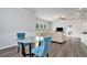 Open floor plan with dining area, living room, hardwood flooring and natural light at 3901 Shelleydale Dr, Powder Springs, GA 30127