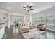 Spacious living room showcases an open floor plan with hardwood flooring, natural light, and cozy seating at 3901 Shelleydale Dr, Powder Springs, GA 30127