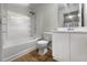 A bathroom with a bathtub and a shower head at 18201 Waldrop Cv, Decatur, GA 30034