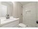 Bathroom featuring white marble tile in shower at 313 Linda Dr, Tucker, GA 30084