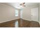 Bedroom features ceiling fan and hardwood floors at 313 Linda Dr, Tucker, GA 30084