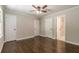 Bedroom featuring multiple closets and hardwood floors at 313 Linda Dr, Tucker, GA 30084