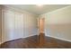 Bedroom featuring hardwood floors and closet at 313 Linda Dr, Tucker, GA 30084