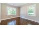 Bedroom featuring hardwood floors and natural light at 313 Linda Dr, Tucker, GA 30084