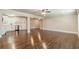 Open-concept living and kitchen area with gleaming hardwood floors at 313 Linda Dr, Tucker, GA 30084