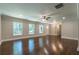 Spacious living room with gleaming hardwood floors and recessed lighting at 313 Linda Dr, Tucker, GA 30084