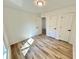 Bedroom with hardwood floors, multiple closets, and natural light creates a cozy retreat at 101 Summer Pond Trl, Lawrenceville, GA 30046