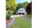A well maintained 2-story home featuring a 2 car garage, and manicured lawn at 101 Summer Pond Trl, Lawrenceville, GA 30046