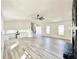 Spacious and bright living room has vaulted ceilings, modern lighting, and beautiful flooring at 101 Summer Pond Trl, Lawrenceville, GA 30046