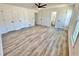 Spacious bedroom with ample closet space, ceiling fan, and bright white walls and trim at 101 Summer Pond Trl, Lawrenceville, GA 30046