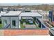 Aerial view of a rooftop patio with lounge seating and a dining area, perfect for enjoying city views at 1226 Chelsea Nw Cir, Atlanta, GA 30318