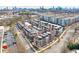 Wide aerial view of a modern townhome community with rooftop decks and convenient parking in an urban setting at 1226 Chelsea Nw Cir, Atlanta, GA 30318