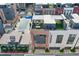 Aerial view of modern townhomes with rooftop patios, a pool, and well-maintained landscaping at 1226 Chelsea Nw Cir, Atlanta, GA 30318