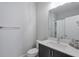 Modern bathroom featuring a vanity and a large mirror, with contemporary finishes at 1226 Chelsea Nw Cir, Atlanta, GA 30318