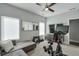Bedroom featuring an exercise bike and a large TV, a perfect setup for workouts at 1226 Chelsea Nw Cir, Atlanta, GA 30318