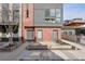 Modern brick townhome with concrete entryway, showcasing the home's facade at 1226 Chelsea Nw Cir, Atlanta, GA 30318