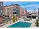 Modern brick townhome featuring a community pool and outdoor bar, perfect for entertaining at 1226 Chelsea Nw Cir, Atlanta, GA 30318