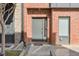 Modern brick townhome entrance, showcasing the property's front door and entryway at 1226 Chelsea Nw Cir, Atlanta, GA 30318