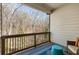 Serene covered porch featuring comfortable seating, a peaceful view of the surrounding trees, and a relaxing atmosphere at 2353 Medlock Ln, Decatur, GA 30033