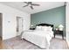 Bedroom with stylish rug, ceiling fan, and large windows with natural light at 332 Gibson Se St, Atlanta, GA 30316