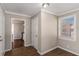 Hallway with wood-look flooring that connects to other areas of the home, next to the kitchen at 1743 Thomas Ter, Decatur, GA 30032