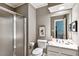 Cozy bathroom featuring a shower, sink, and toilet at 857 Stovall Ne Pl, Atlanta, GA 30342