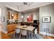 Dining area with built in bar/credenza and modern table set with seating for six at 857 Stovall Ne Pl, Atlanta, GA 30342
