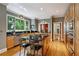 Eat-in kitchen with large island, stainless steel appliances, and views into the dining room at 857 Stovall Ne Pl, Atlanta, GA 30342