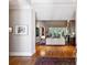 Elegant living room showcasing hardwood floors, neutral paint and a seamless transition to other living areas at 857 Stovall Ne Pl, Atlanta, GA 30342