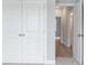 View down a hallway with closet space and an open door leading into another room at 1330 Parc Bench Rd, Atlanta, GA 30316