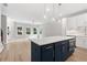 Open concept kitchen with stainless steel appliances, a large island and lots of natural light at 1330 Parc Bench Rd, Atlanta, GA 30316