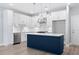 Well-lit kitchen with stainless steel appliances, kitchen island, and white countertops at 1330 Parc Bench Rd, Atlanta, GA 30316