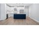 Beautiful new kitchen featuring a stylish island, stainless steel appliances, and hardwood flooring at 1330 Parc Bench Rd, Atlanta, GA 30316