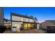 View of the home's backyard featuring a screened porch, grill, and black aluminum fence at 1590 Branthaven Ln, Auburn, GA 30011