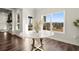 Breakfast nook features a marble table and views of the landscaped backyard at 1590 Branthaven Ln, Auburn, GA 30011