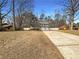 Lovely home featuring a large driveway and a well-maintained front lawn at 25 Cloud Forest Ct, Stockbridge, GA 30281