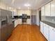 Spacious kitchen with stainless steel appliances and abundant cabinet space at 25 Cloud Forest Ct, Stockbridge, GA 30281