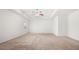 Spacious carpeted main bedroom with trey ceiling and a ceiling fan at 1390 Napa Valley Sw Dr, Lawrenceville, GA 30045